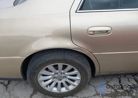 2005 Cadillac Deville Standard z USA, uszkodzony, nr VIN 1G6KD54Y65U160171
